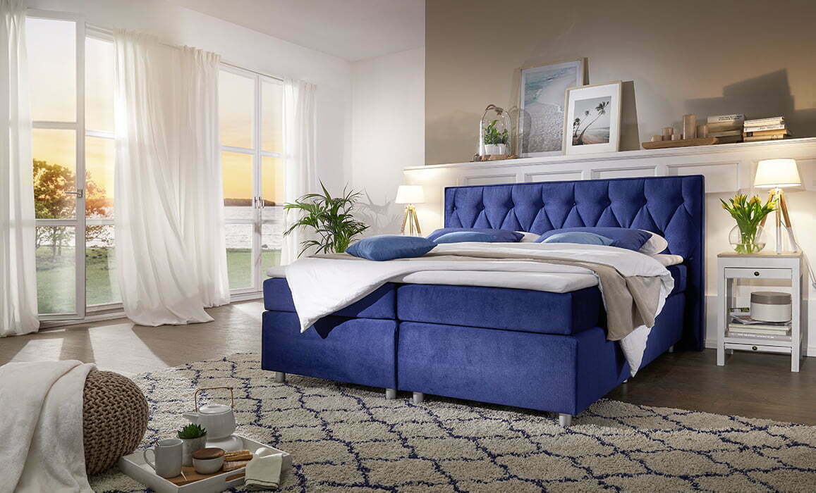 Wysokie łóżka do sypialni - niebieskie łóżko kontynentalne Blue Ocean